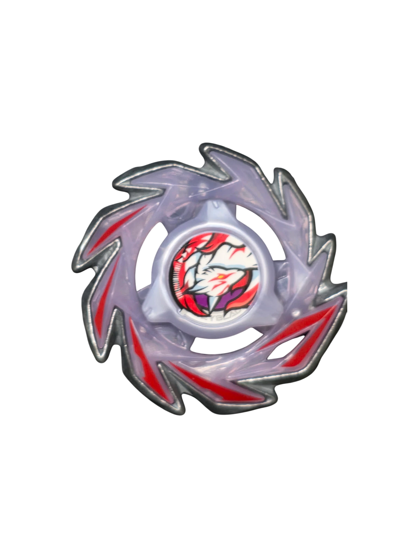 My Store Brush Fox Beyblade X main blade and lock chip in translucent purple with red accents on bubble wrap.