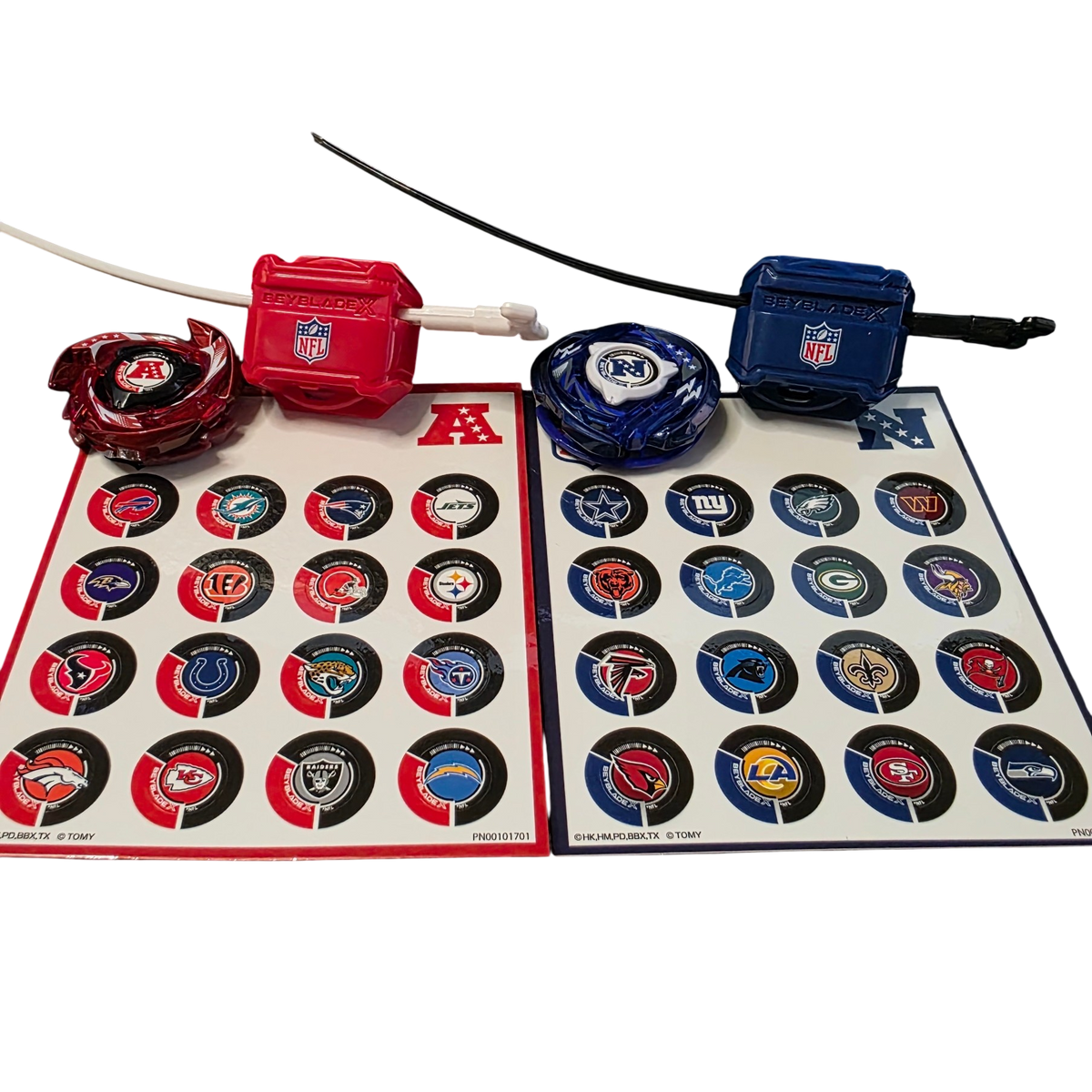 My Store NFL AFC vs NFC Beyblade X blade set with red and blue launchers and team logo sticker sheets.
