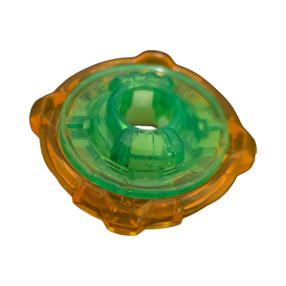My Store authentic Hasbro Beyblade X 4-60 Ratchet part in translucent green and orange plastic.